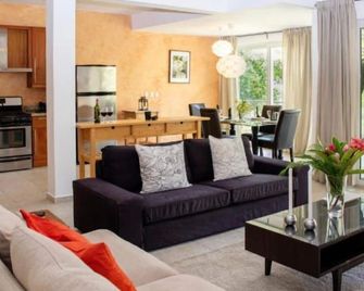 2 Bedroom 3 bath Beachfront Condo - Sosúa - Wohnzimmer