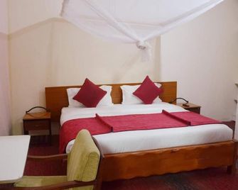 Sunset Oak Hotel Nakuru - Nakuru - Schlafzimmer