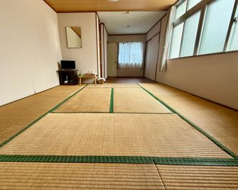 Reef Inn Kuniyoshi - Tokashiki - Schlafzimmer