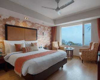 Royal Orchid Fort Resort - מוסורי - חדר שינה