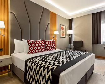 Ramada Encore by Wyndham Istanbul Sisli - Istanbul - Bedroom