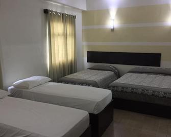 Metro Park Hotel Mandaue - Mandaue City - Slaapkamer