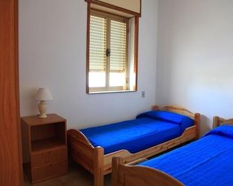 Appartamenti Mancaversa - Taviano - Camera da letto