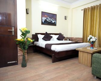 Panch Aarohan Hotel King - Pithorāgarh - Bedroom