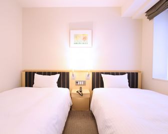 Koko Hotel Sendai Station West - Sendai - Schlafzimmer