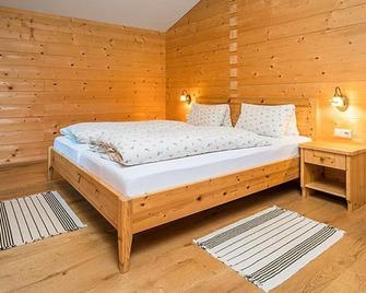 Apartment 'Kreuzkogel' in the organic log cabin - Rindereben, Bauerndörfl - Hüttschlag - Schlafzimmer