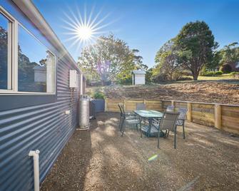 Blossoms on the Bay - 4 Bedrooms - Port Arthur - Patio