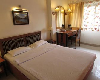 Hotel Grape City - 納希克 - 臥室