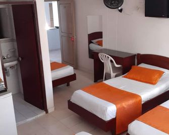 Hotel Center - Ibagué - Habitación