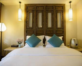 Songshi Guqin Inn - Lijiang - Schlafzimmer
