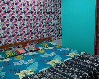 Jharana Guest House - Puri - Bedroom