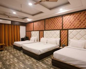 Hotel Dev Residency - Neemuch - Bedroom