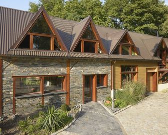 la maison dans les bois - Briollay - Bâtiment