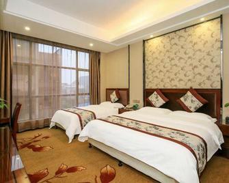 Guilin Xinbin International Hotel Railway Station (Nanxishan Park) - Guilin - Schlafzimmer
