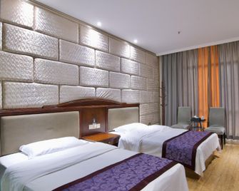 Aiwujia Business Hotel (Wuliangye Road Branch) - Yibin - Bedroom