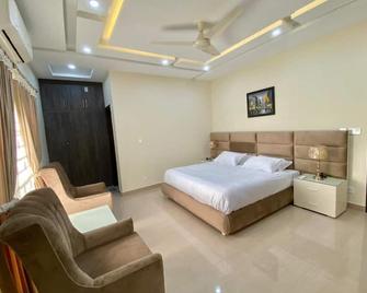 Continental boutique House - 伊斯蘭堡 - 臥室
