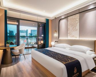 Ningbo Huagang Bund Hotel - Ningbo - Bedroom