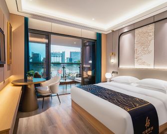 Ningbo Huagang Bund Hotel - Ningbo - Bedroom