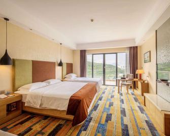 Days Hotel Suites Yangjiang - Yangjiang - Habitación