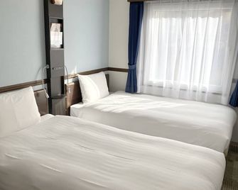 Toyoko Inn Okayama eki Higashi guchi - אוקאימה - חדר שינה