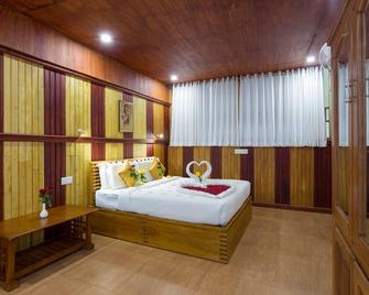 At Wood Munnar - Devikolam - Bedroom