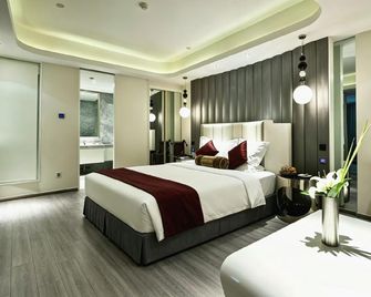 Baili Zhongzhou International Hotel (Zijing Mountain-Erqi Business Circle) - ז'נגז'ו - חדר שינה