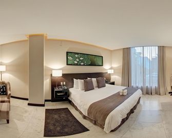 Studio Hotel Boutique - Santa Ana - Ložnice