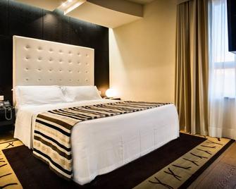 Sardegna Hotel - Suites & Restaurant - Cagliari - Yatak Odası