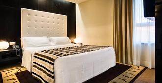 Sardegna Hotel, Suites & Restaurant - קליארי - חדר שינה