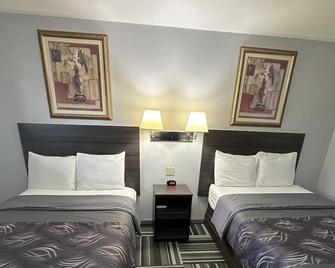 Relax Inn - Saginaw - Saginaw - Bedroom