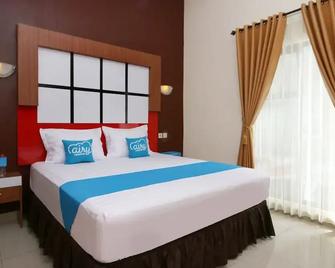 Airy Bandara Syamsudin Noor Angkasa 7 Banjarbaru - Banjarbaru - Schlafzimmer