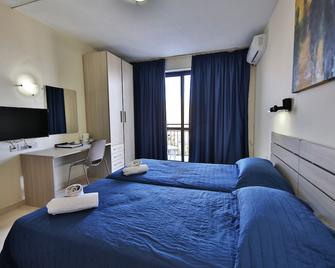 Relax Inn Hotel - Bugibba - Camera da letto