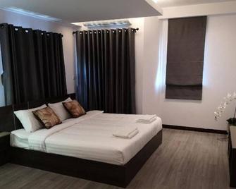 Campagne Hotel And Residence - Sha Plus - Pathumthani - Schlafzimmer