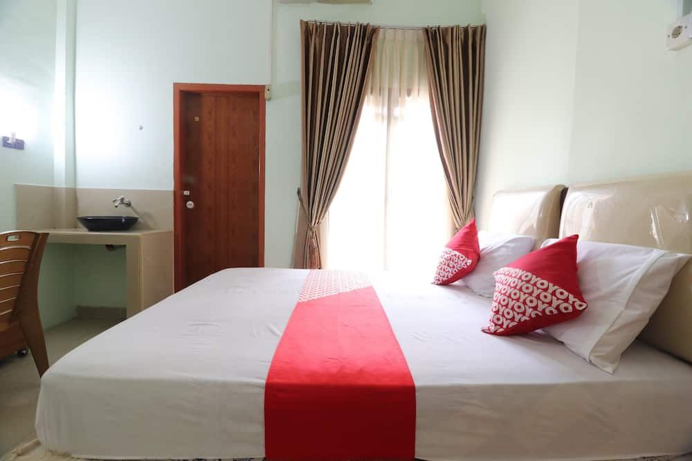 Hotel O Excellent Kost - Jambi - Schlafzimmer
