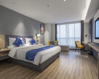Yeste Hotel (Qinzhou Renmin Road Dahuayuan) - Qinzhou - Schlafzimmer