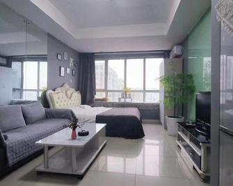 Qingdao Lanting Holiday Apartment - Qingdao - Bedroom