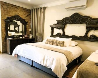 Maison de Leo Luxury Guesthouse - Pretoria - Slaapkamer