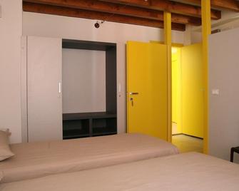 Luogo Comune Ostello - Brescia - Chambre