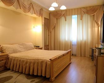 Hotel Strelec - Celjabinsk - Camera da letto