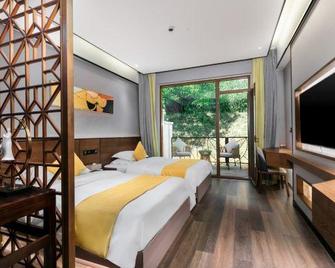Pu'er Tea Garden Resort Hotel(Pu'er Tea Expo Garden) - Pu'er - Bedroom