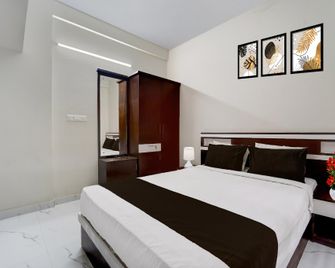 Collection O Aluva Kinfra Hi-Tech Park - Alwaye - Bedroom