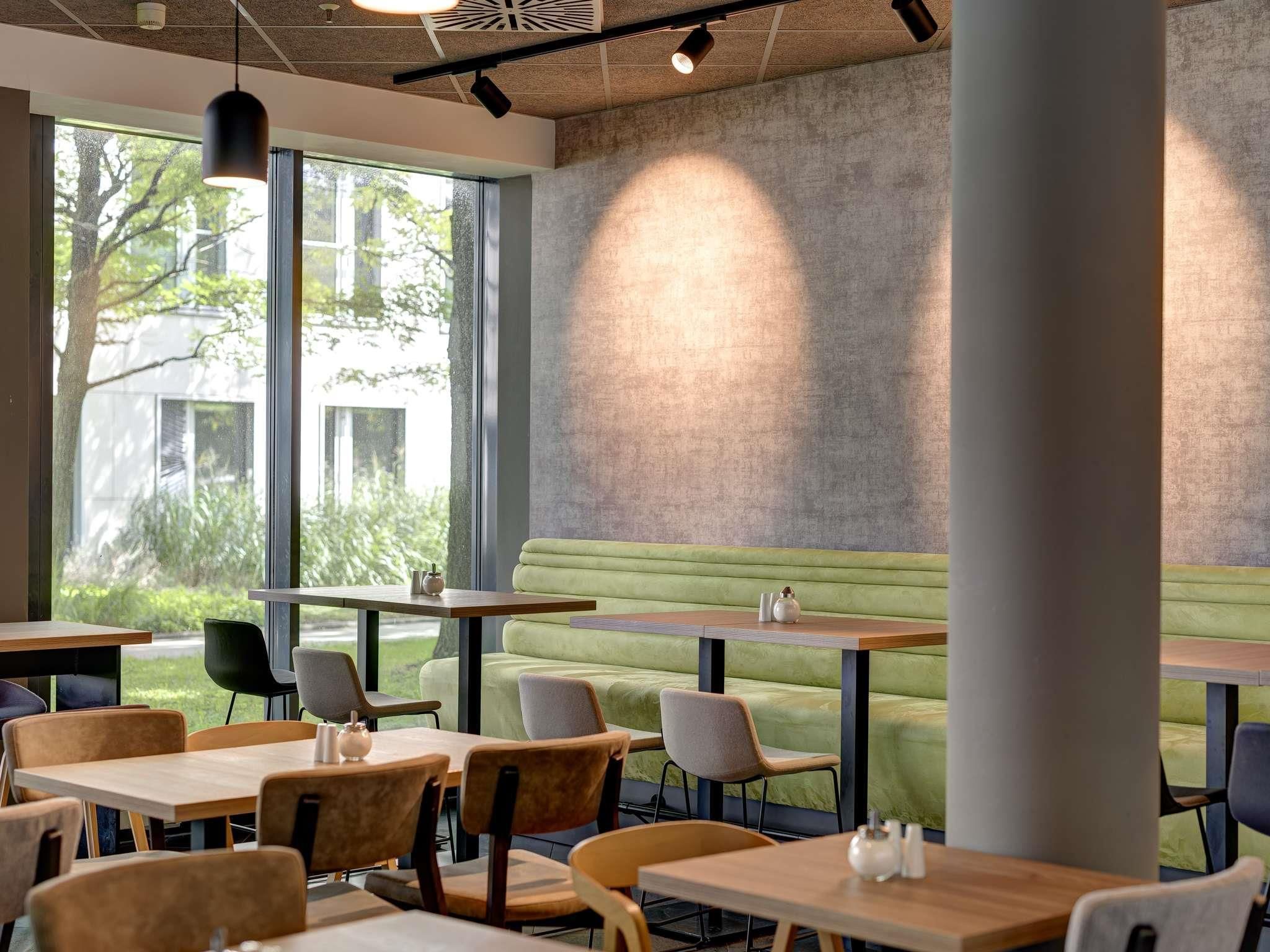 Novotel Suites München Parkstadt Schwabing - מינכן - מסעדה