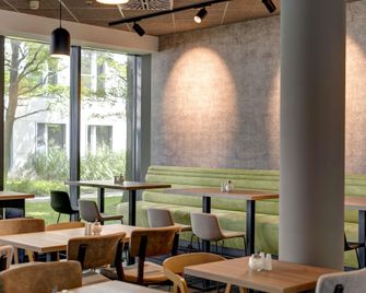 Novotel Suites München Parkstadt Schwabing - מינכן - מסעדה