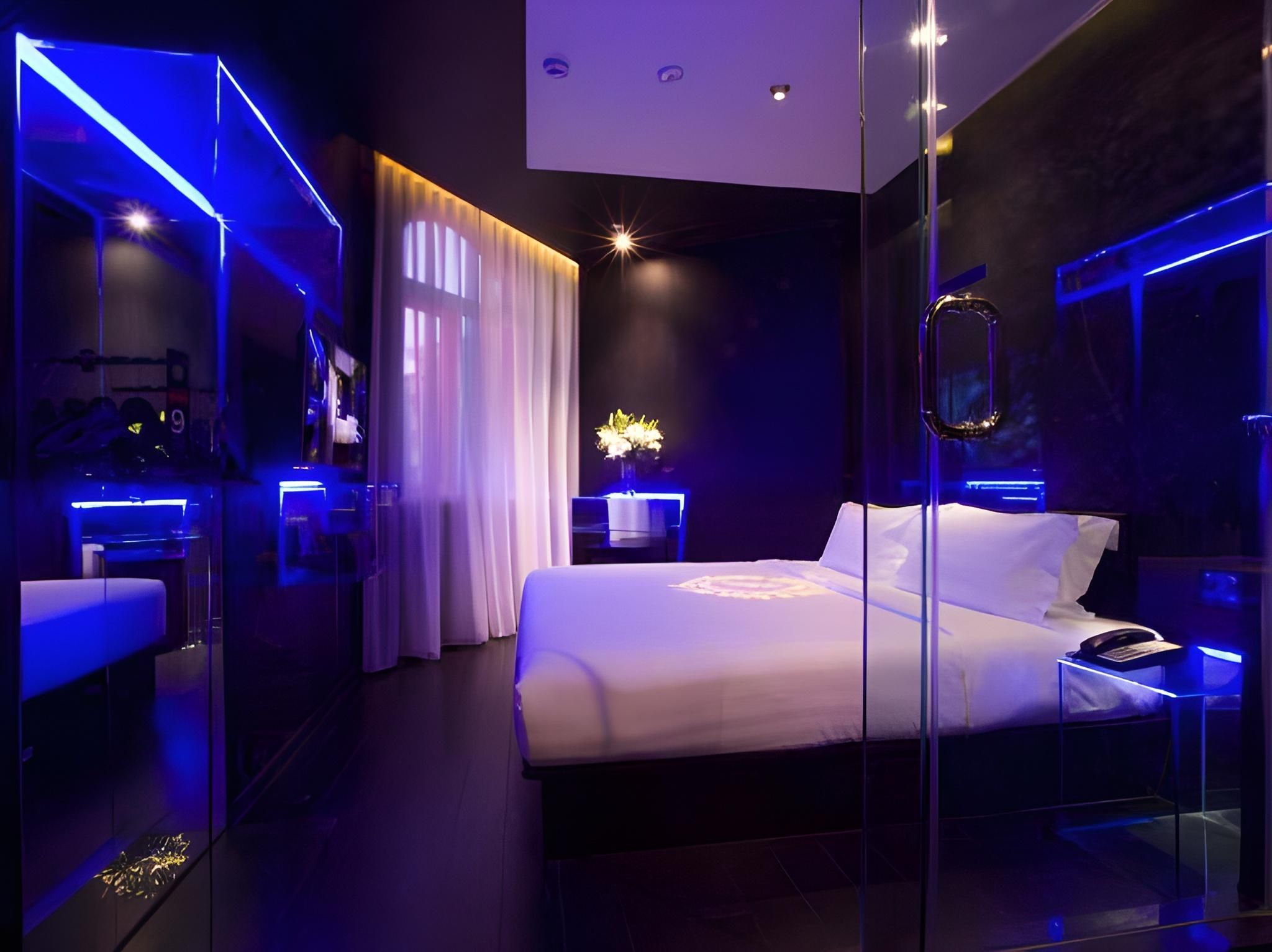 Orange Hotel Qingdao Haier Road Shilaoren Bathing Beach - تشينغداو - غرفة نوم