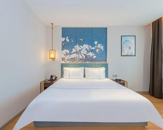 Magnotel Hotel Nanchang Minde Road Bayi Hall - נאנצ'אנג - חדר שינה
