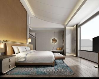 DoubleTree by Hilton Jiangxi Fuzhou - Fuzhou - Schlafzimmer