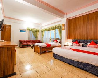 OYO 2855 Sartika Hotel Pati - Pati - Habitación