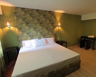 Starmark Hotel - Naga - Camera da letto