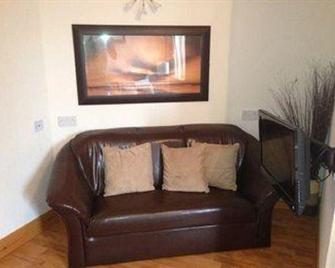 Lairg Highland Hotel - Lairg - Huiskamer