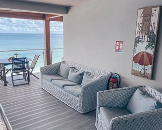 Tiki Unit, one bedroom studio, furnished., second floor street side - Grand-Case - Living room